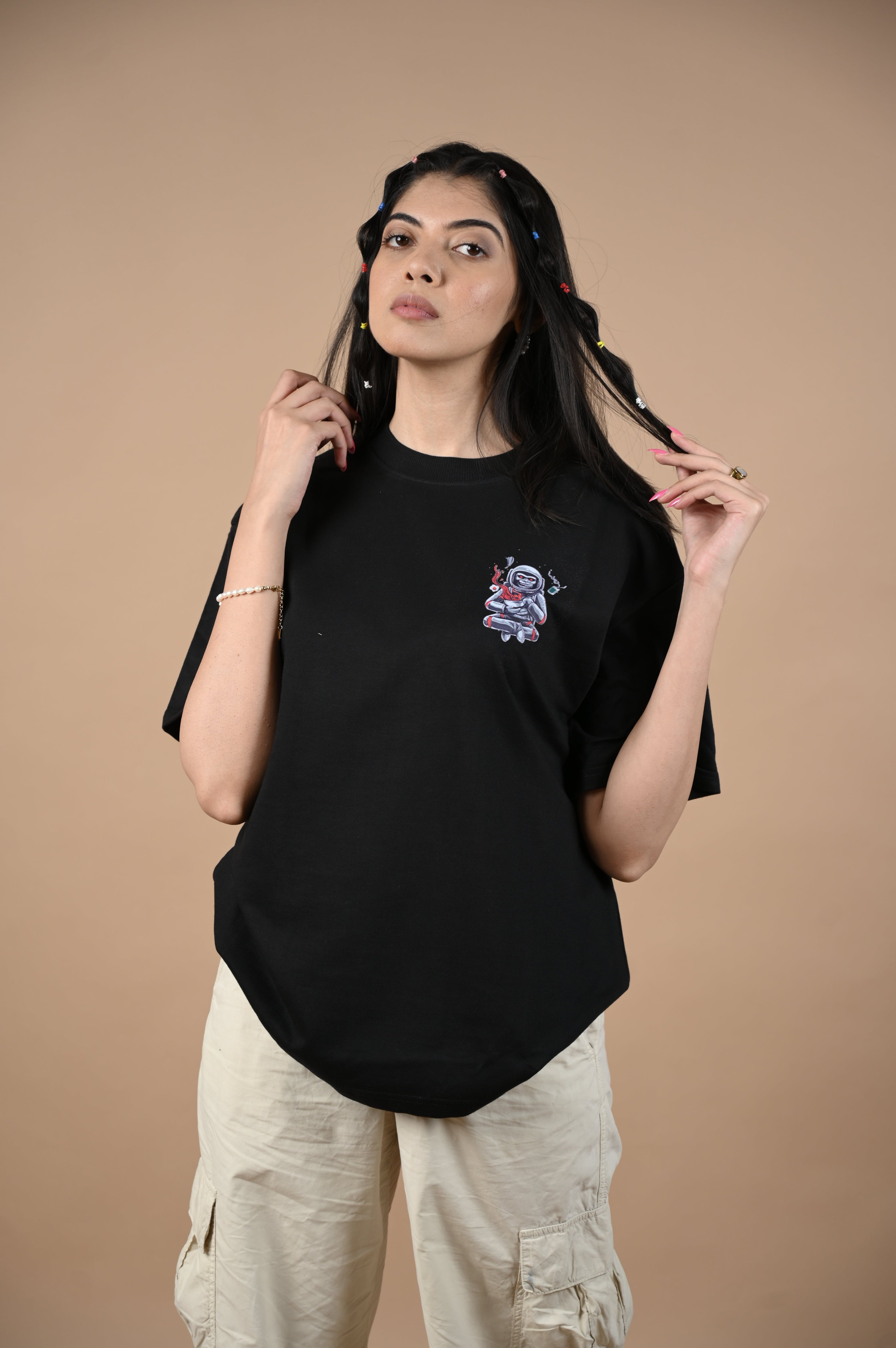 Astronaut 100% Cotton Oversized Black T-shirt at Kamakhyaa by Unfussy. This item is 100% cotton, Black, Casual Wear, Organic, Oversized Fit, Printed, T-Shirts, Unfussy, Unisex, Womenswear