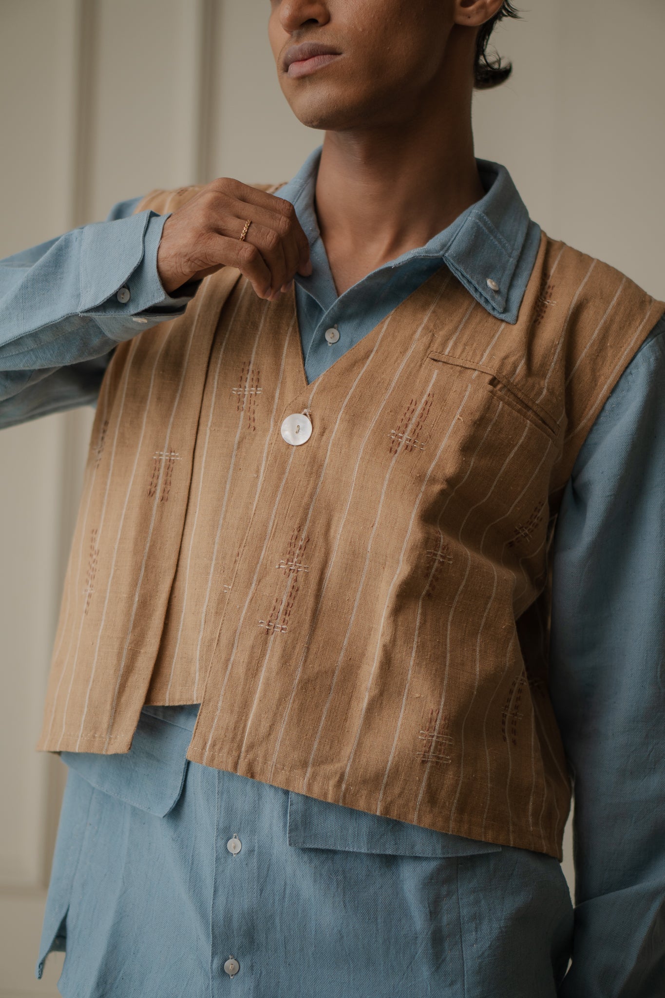 Asymmetric Unisex Waistcoat at Kamakhyaa by Lafaani. This item is 100% pure cotton, Brown, Casual Wear, Materiality, Menswear, Natural with azo free dyes, Organic, Regular Fit, Solids, Sonder, Undyed and Unbleached, Unisex, Waistcoat
