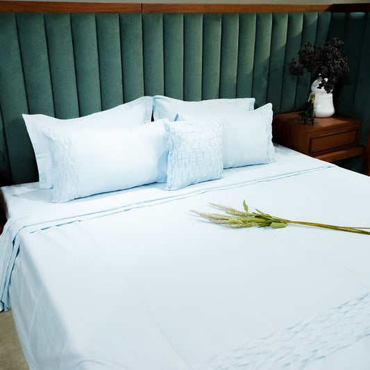 Azure Whisper Honeycomb Serenity Bedsheet Set with Pillow Covers at Kamakhyaa by Aetherea. This item is Designer Bedsheets, Home