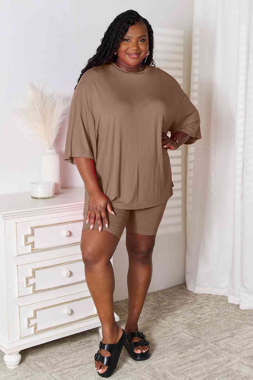 Basic Bae Full Size Soft Rayon Three-Quarter Sleeve Top and Shorts Set at Kamakhyaa by Trendsi. This item is Basic Bae, Ship from USA, Trendsi, Womenswear