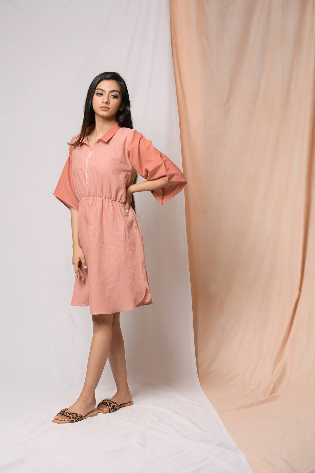 Battle To Breathe Peach Midi Dress at Kamakhyaa by Niraa. This item is Casual Wear, Cotton khadi, Mini Dresses, Natural with azo dyes, Peach, Regular Fit, Shirt Dresses, Solids, Tales of rippling brooks, Womenswear