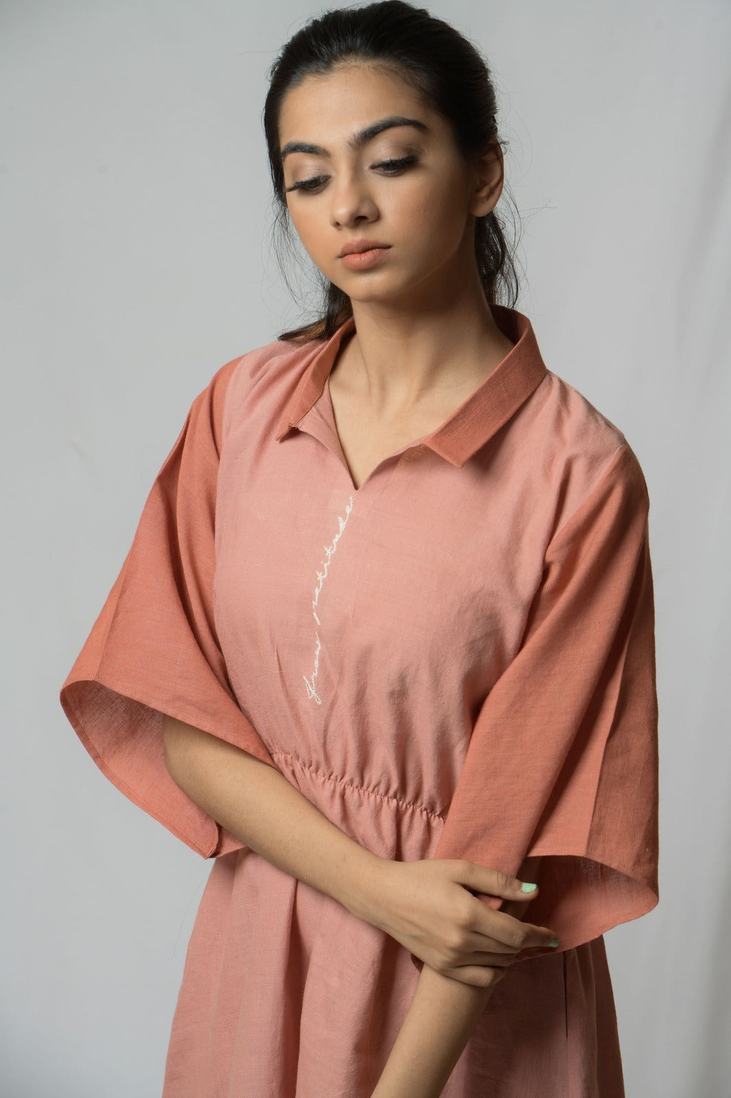 Battle To Breathe Peach Midi Dress at Kamakhyaa by Niraa. This item is Casual Wear, Cotton khadi, Mini Dresses, Natural with azo dyes, Peach, Regular Fit, Shirt Dresses, Solids, Tales of rippling brooks, Womenswear