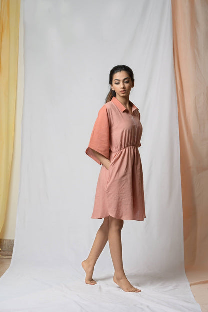 Battle To Breathe Peach Midi Dress at Kamakhyaa by Niraa. This item is Casual Wear, Cotton khadi, Mini Dresses, Natural with azo dyes, Peach, Regular Fit, Shirt Dresses, Solids, Tales of rippling brooks, Womenswear