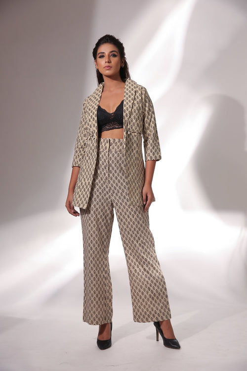 Beige Block Print Blazer And Pant Set at Kamakhyaa by Keva. This item is Beige, Black, Block Prints, Co-ord Sets, Cotton, Natural, Office, Office Wear Co-ords, Printed Selfsame, Relaxed Fit, Resort Wear, Womenswear, Zima