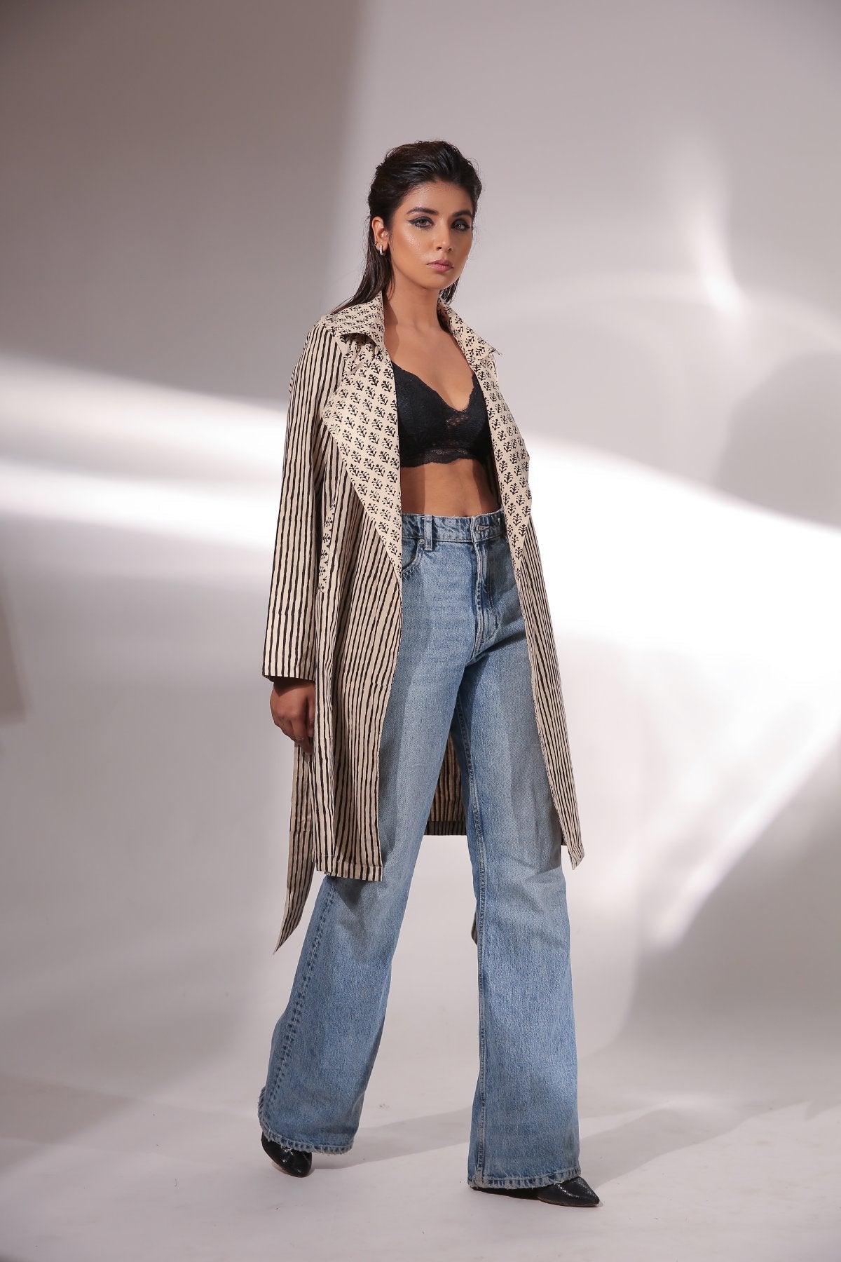 Beige Block Print Trench Coat at Kamakhyaa by Keva. This item is Beige, Black, Block Prints, Cotton, Natural, Relaxed Fit, Resort Wear, Stripes, Trench Coats, Womenswear, Zima