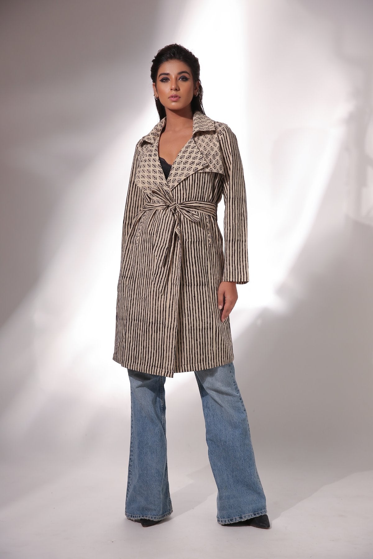 Beige Block Print Trench Coat at Kamakhyaa by Keva. This item is Beige, Black, Block Prints, Cotton, Natural, Relaxed Fit, Resort Wear, Stripes, Trench Coats, Womenswear, Zima