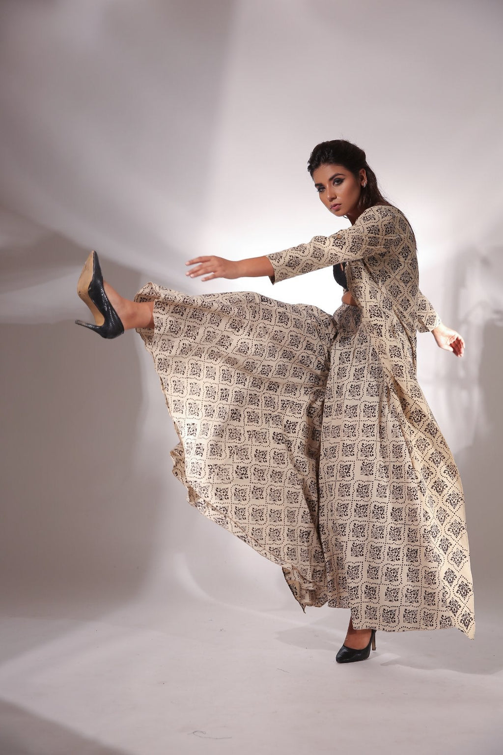 Beige Block Printed Cape With Pants at Kamakhyaa by Keva. This item is Beige, Black, Block Prints, Cape, Co-ord Sets, Cotton, Natural, Office, Office Wear Co-ords, Printed Selfsame, Relaxed Fit, Resort Wear, Womenswear, Zima