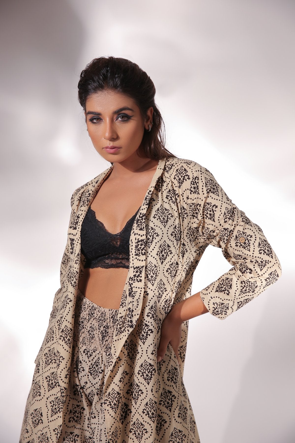 Beige Block Printed Cape With Pants at Kamakhyaa by Keva. This item is Beige, Black, Block Prints, Cape, Co-ord Sets, Cotton, Natural, Office, Office Wear Co-ords, Printed Selfsame, Relaxed Fit, Resort Wear, Womenswear, Zima