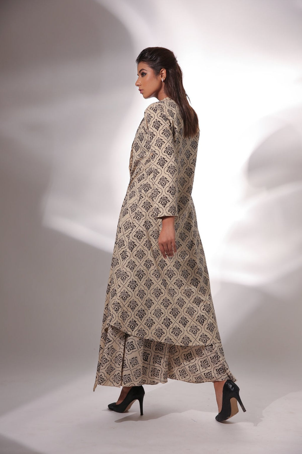 Beige Block Printed Cape With Pants at Kamakhyaa by Keva. This item is Beige, Black, Block Prints, Cape, Co-ord Sets, Cotton, Natural, Office, Office Wear Co-ords, Printed Selfsame, Relaxed Fit, Resort Wear, Womenswear, Zima