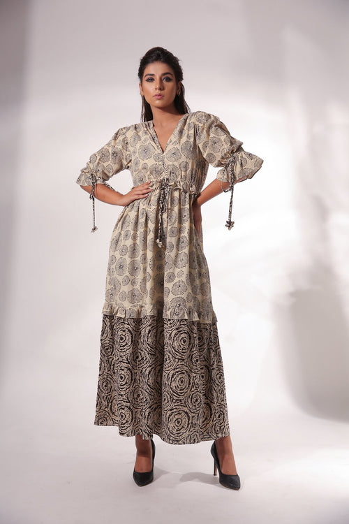 Beige Block Printed Maxi Dress at Kamakhyaa by Keva. This item is Beige, Black, Block Prints, Cotton, For Anniversary, For Daughter, Kurtas, Maxi Dresses, Natural, Relaxed Fit, Resort Wear, Tiered Dresses, Womenswear, Zima