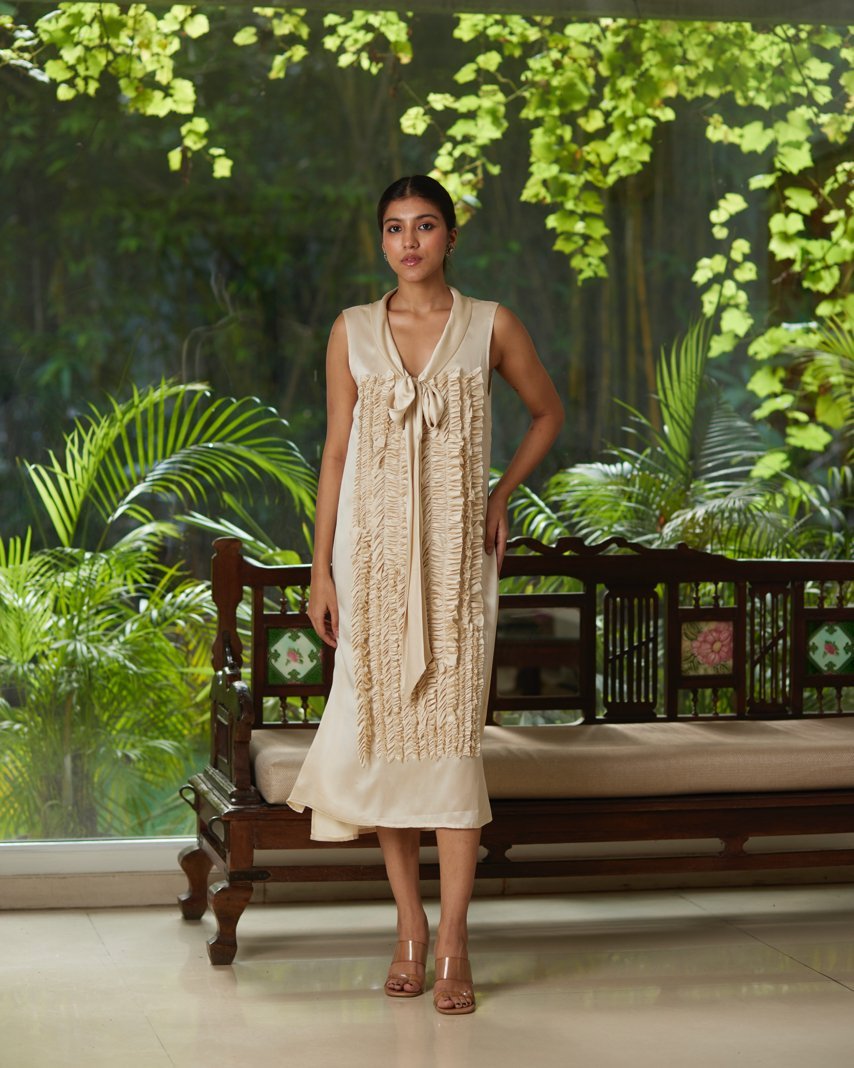 Beige Satin Silk Sleeveless Ruffled Dress at Kamakhyaa by Mayura Kumar. This item is Beige, Dresses, Festive Wear, Mayura Kumar, Regular Fit, Satin, Silk, Sleeveless Dresses, Solids, Womenswear