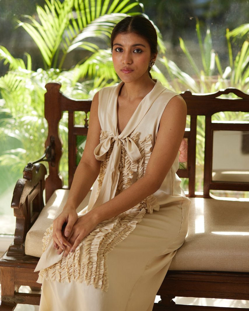Beige Satin Silk Sleeveless Ruffled Dress at Kamakhyaa by Mayura Kumar. This item is Beige, Dresses, Festive Wear, Mayura Kumar, Regular Fit, Satin, Silk, Sleeveless Dresses, Solids, Womenswear