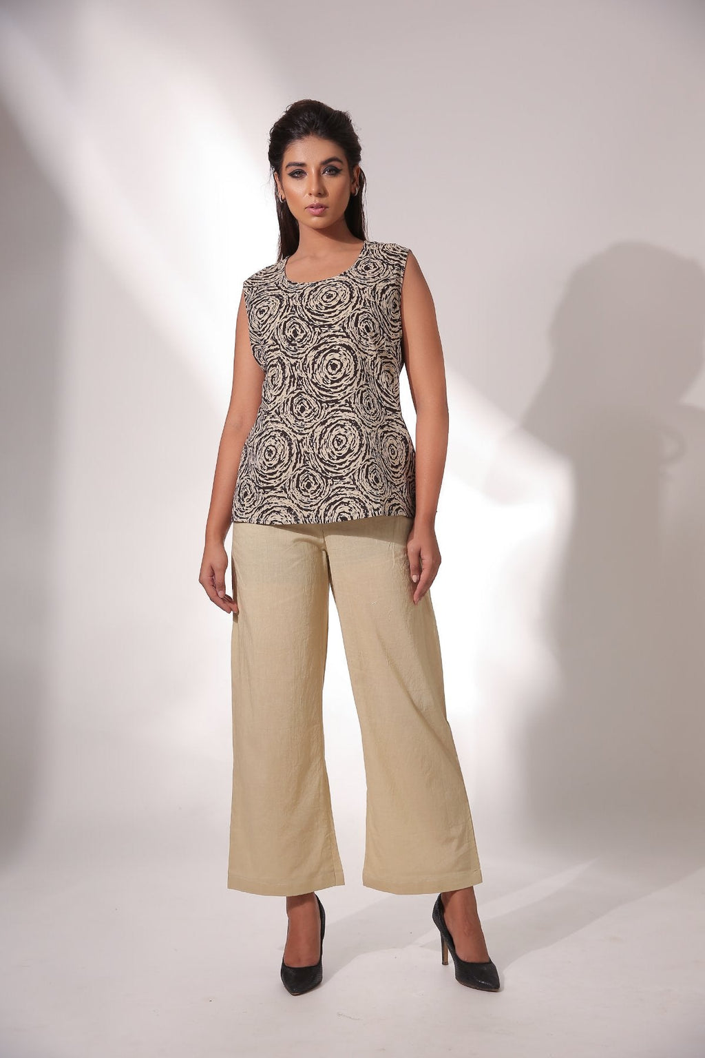 Beige Sleeveless Top With Pant & Cape at Kamakhyaa by Keva. This item is Beige, Black, Block Prints, Co-ord Sets, Cotton, Natural, Office, Office Wear Co-ords, Relaxed Fit, Resort Wear, Womenswear, Zima