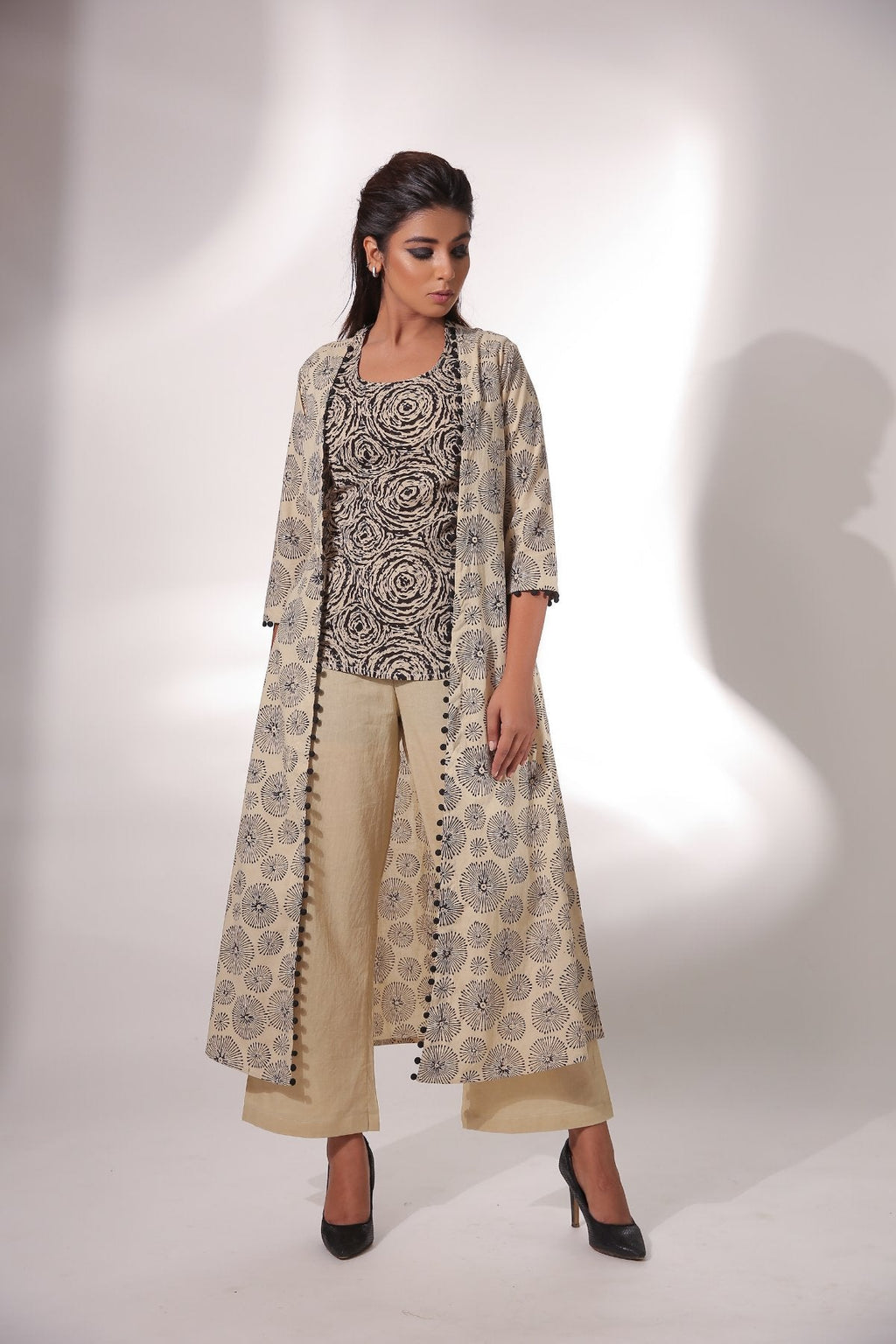 Beige Sleeveless Top With Pant & Cape at Kamakhyaa by Keva. This item is Beige, Black, Block Prints, Co-ord Sets, Cotton, Natural, Office, Office Wear Co-ords, Relaxed Fit, Resort Wear, Womenswear, Zima