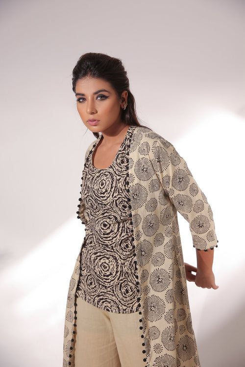 Beige Sleeveless Top With Pant & Cape at Kamakhyaa by Keva. This item is Beige, Black, Block Prints, Co-ord Sets, Cotton, Natural, Office, Office Wear Co-ords, Relaxed Fit, Resort Wear, Womenswear, Zima