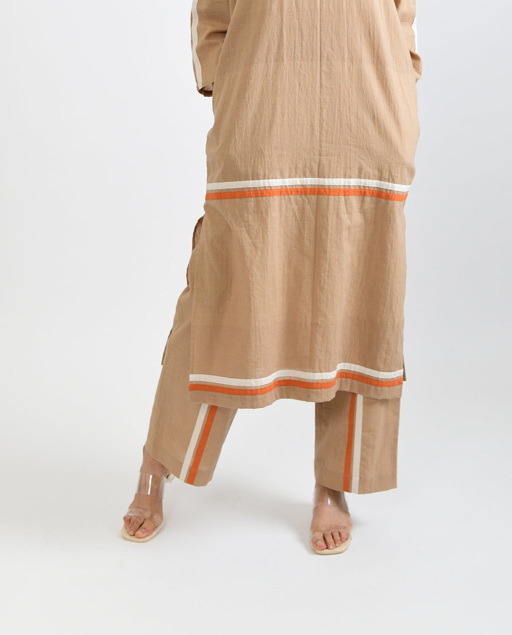 Beige Solid Co-ord Set at Kamakhyaa by Rias Jaipur. This item is Beige, Casual Wear, Co-ord Sets, For Mother, Handloom Cotton, Handspun, Handwoven, Hue, Relaxed Fit, Solids, Stripes, Travel, Travel Co-ords, Womenswear