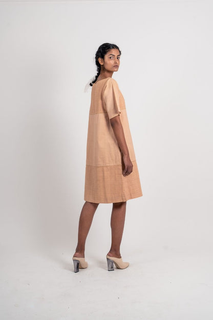 Beige Textured Plain Dress at Kamakhyaa by Ahmev. This item is Brown, Casual Wear, Fall, Handloom Cotton, July Sale, July Sale 2023, Mini Dresses, Natural, Relaxed Fit, Textured, Womenswear