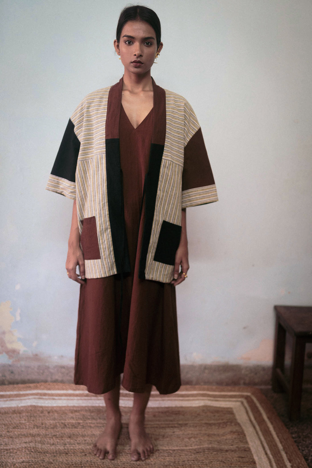 Black And Brown Reversible Jacket at Kamakhyaa by Deeta Clothing. This item is Black, Brown, Casual Wear, Handwoven Cotton, Jackets, Natural with azo dyes, Relaxed Fit, Reversible, Shibui AW22, Stripes, Womenswear