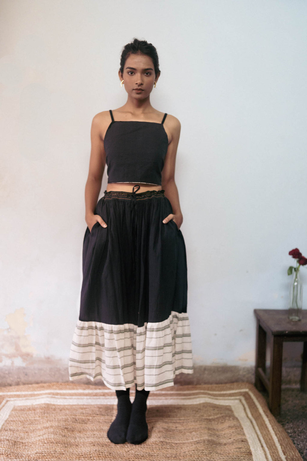Black And White Cotton Skirt at Kamakhyaa by Deeta Clothing. This item is Black, Casual Wear, Handwoven Cotton, Midi Skirts, Natural with azo dyes, Relaxed Fit, Shibui AW22, Skirts, Solids, White, Womenswear