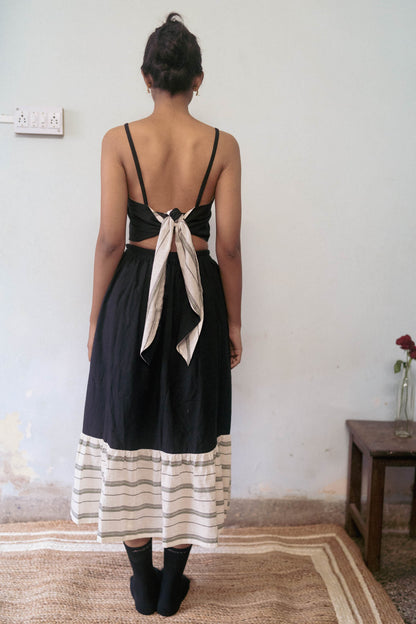 Black And White Cotton Skirt at Kamakhyaa by Deeta Clothing. This item is Black, Casual Wear, Handwoven Cotton, Midi Skirts, Natural with azo dyes, Relaxed Fit, Shibui AW22, Skirts, Solids, White, Womenswear