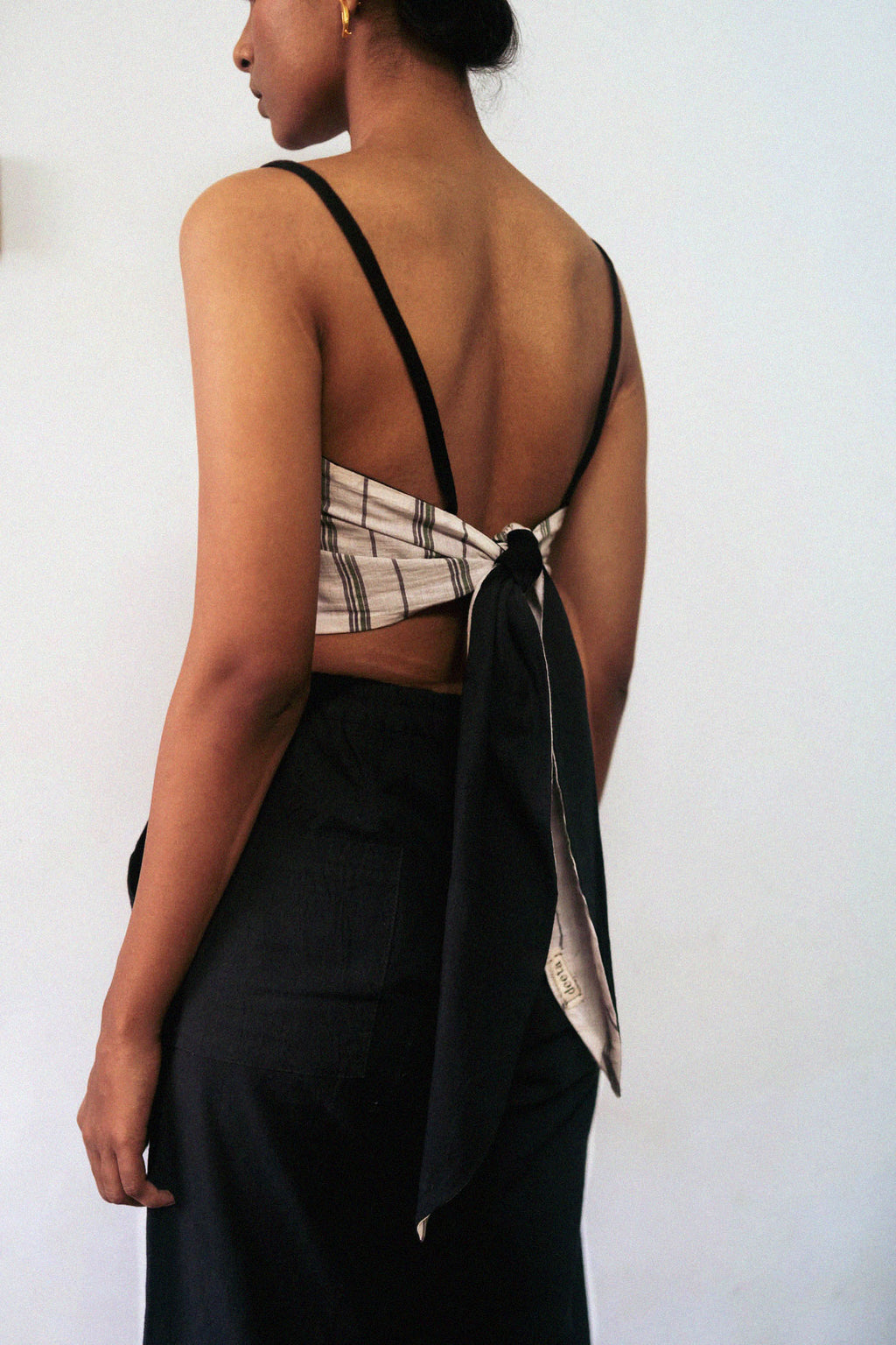 Black And White Reversible Top at Kamakhyaa by Deeta Clothing. This item is Black, Casual Wear, Crop Tops, Fitted, For Siblings, Handwoven Cotton, Lines, Natural with azo dyes, Reversible, Shibui AW22, Solids, White, Womenswear