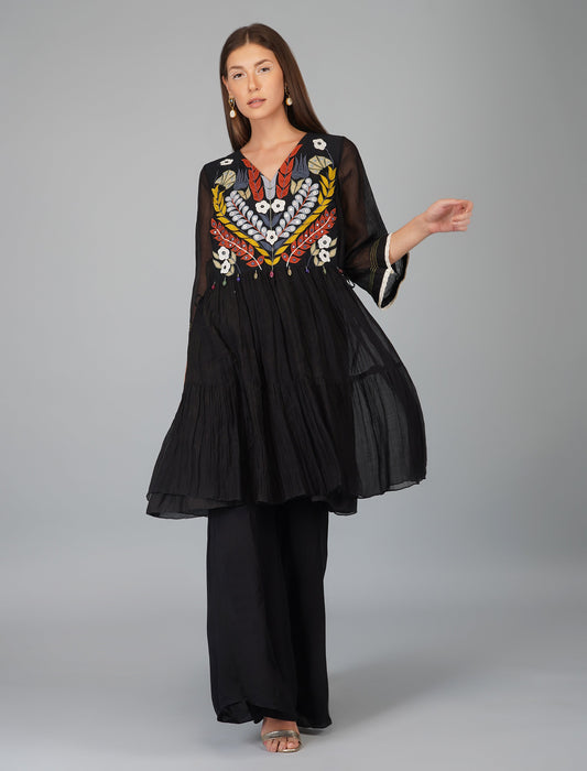 Black Chanderi Hand Embroidered Tiered Tunic Set at Kamakhyaa by Devyani Mehrotra. This item is Black, Chanderi Silk, Co-ord Sets, Embroidered, Evening Wear, Georgette, Natural, Pre Spring 2023, Relaxed Fit, Solids, Vacation Co-ords, Viscose, Womenswear