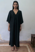 Black Cotton Dress at Kamakhyaa by Deeta Clothing. This item is Black, Casual Wear, Handwoven Cotton, Kaftan Dresses, Kaftans, Maxi Dresses, Natural with azo dyes, Relaxed Fit, Shibui AW22, Solids, Womenswear