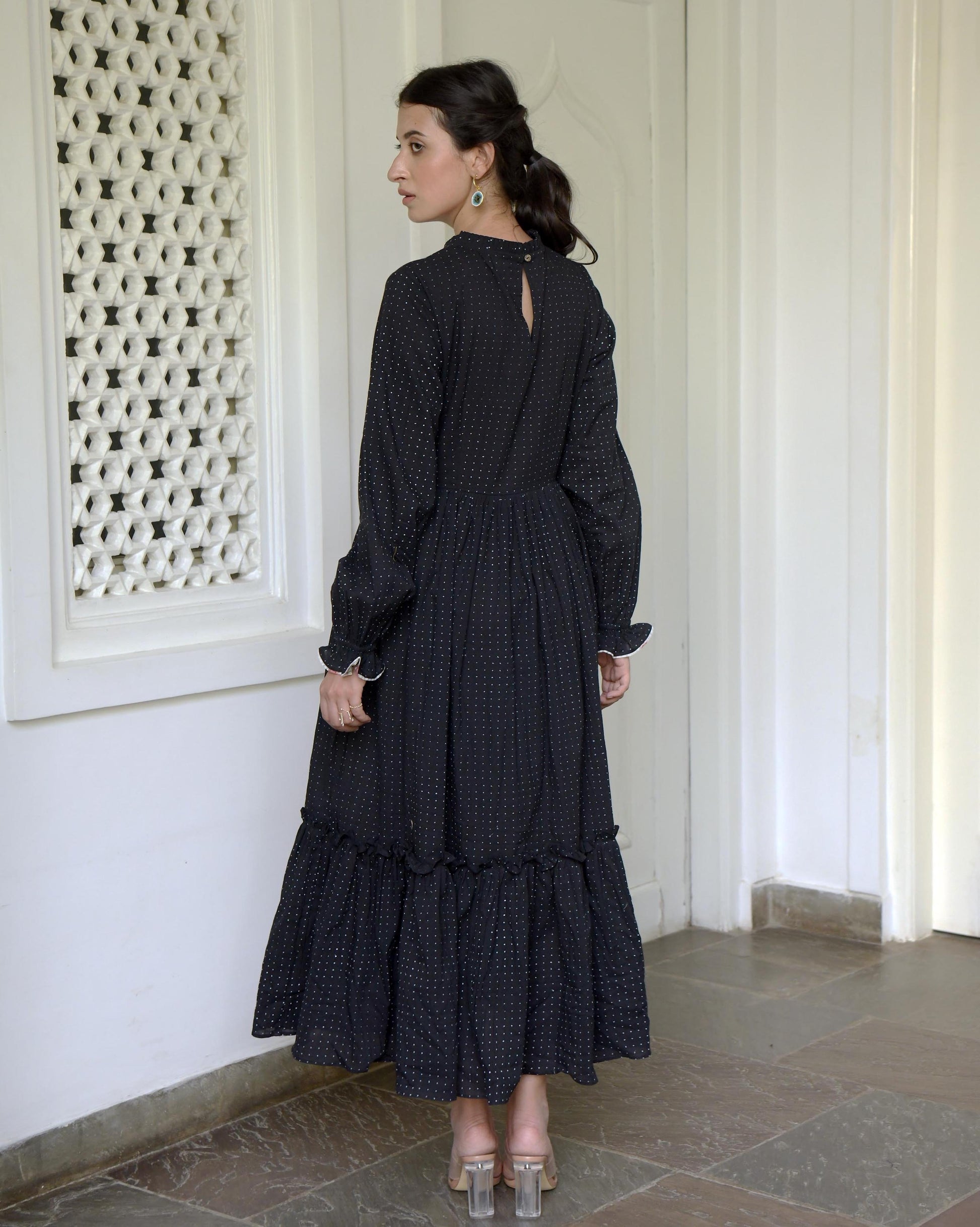Black Cotton Tiered Maxi Dress at Kamakhyaa by Taro. This item is Best Selling, Black, Duplicate, Evening Wear, FB ADS JUNE, For Anniversary, Handwoven Cotton, July Sale, July Sale 2023, Natural, Prints, Regular Fit, Tiered Dresses, Wildflower Taro, Womenswear