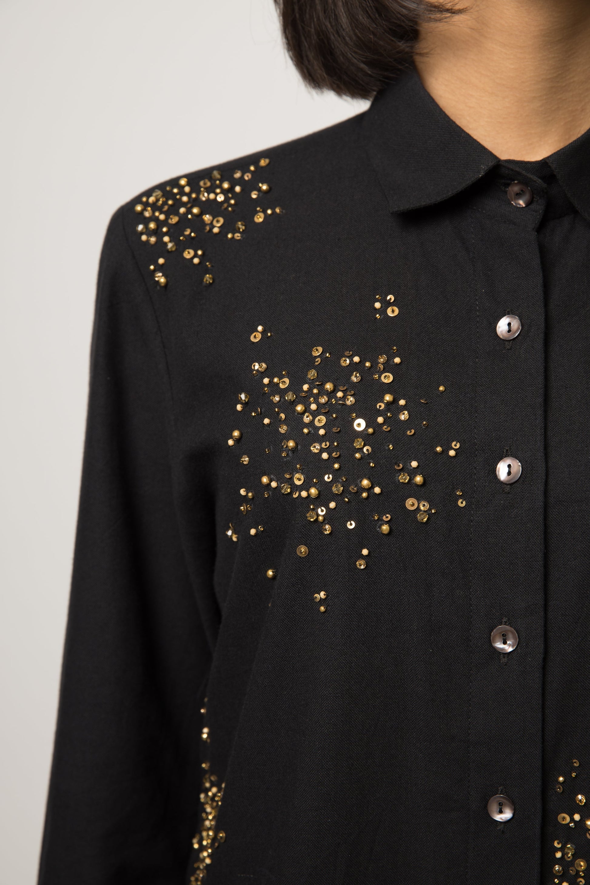 Black Embellished Cotton Shirt at Kamakhyaa by Anushé Pirani. This item is 100% pure cotton, Black, Embellished, Handwoven cotton, Party Wear, Shirts, The Festive Edit, Womenswear