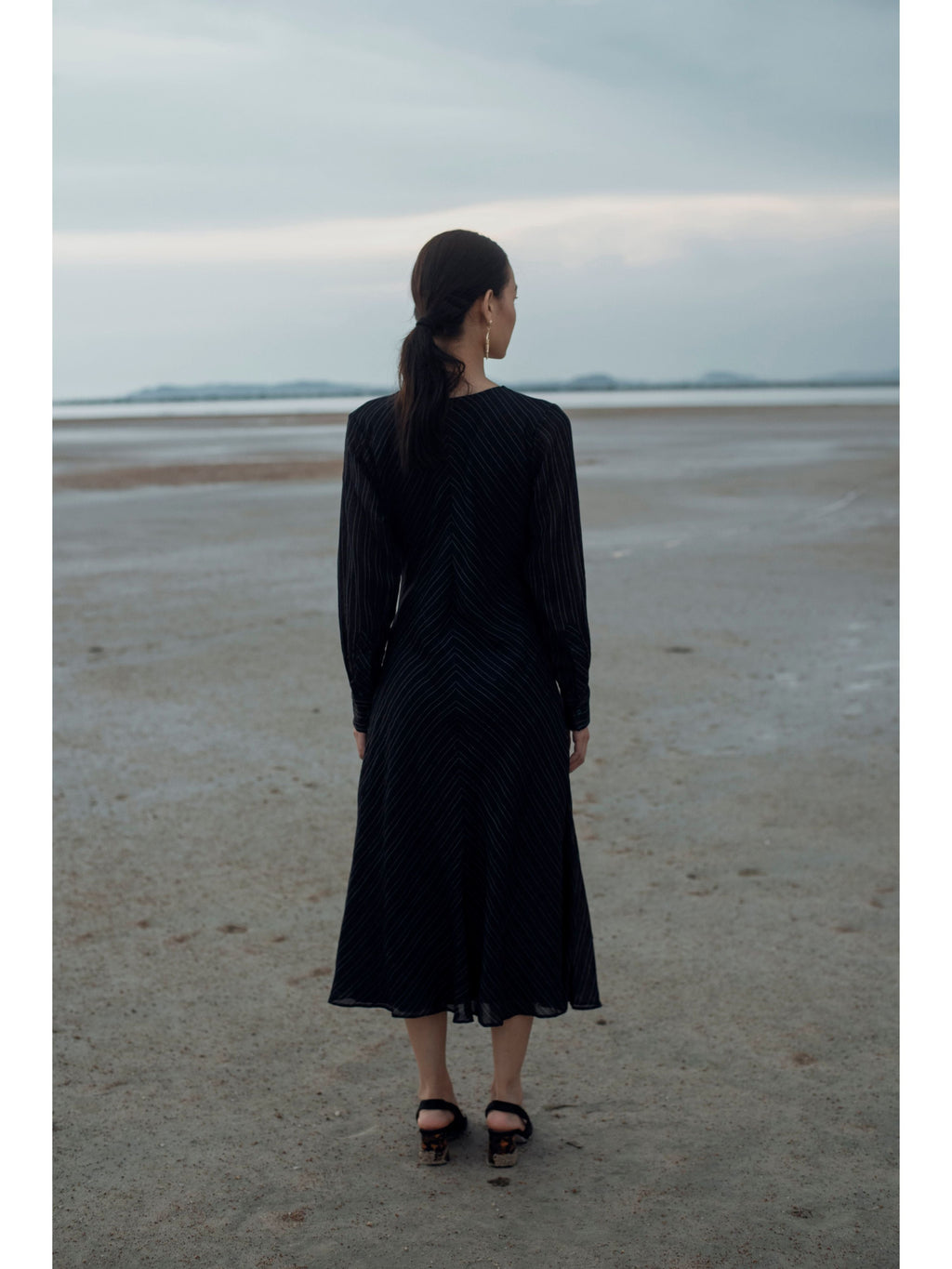 Black Embroidered Midi Dress at Kamakhyaa by The Loom Art. This item is Black, Handwoven silk, July Sale, July Sale 2023, Midi Dresses, Natural, Party Wear, Prints, Regular Fit, Serendipity, Womenswear