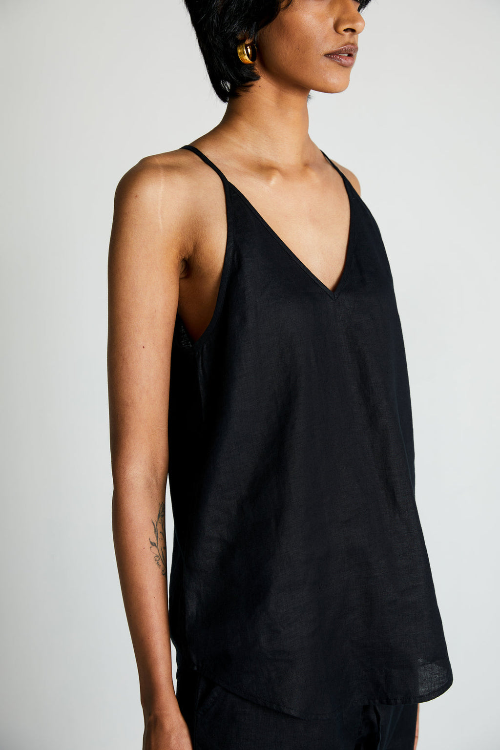 Black Endless Sunday Top at Kamakhyaa by Reistor. This item is Black, Hemp, Less than $50, Natural, Noir, Office Wear, Regular Fit, Solid Selfmade, Solids, Spaghettis, Tops, Womenswear