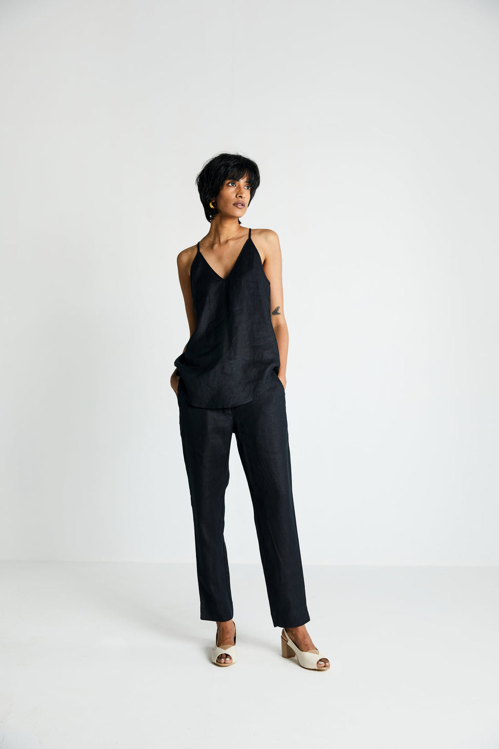 Black Endless Sunday Top at Kamakhyaa by Reistor. This item is Black, Hemp, Less than $50, Natural, Noir, Office Wear, Regular Fit, Solid Selfmade, Solids, Spaghettis, Tops, Womenswear