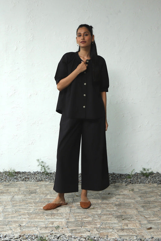 Black Gathered Top Pant Cotton Co-Ord Set at Kamakhyaa by Canoopi. This item is Black, Canoopi, Casual Wear, Complete Sets, Natural, Poplin, Regular Fit, Solids, Vacation Co-ords, Womenswear