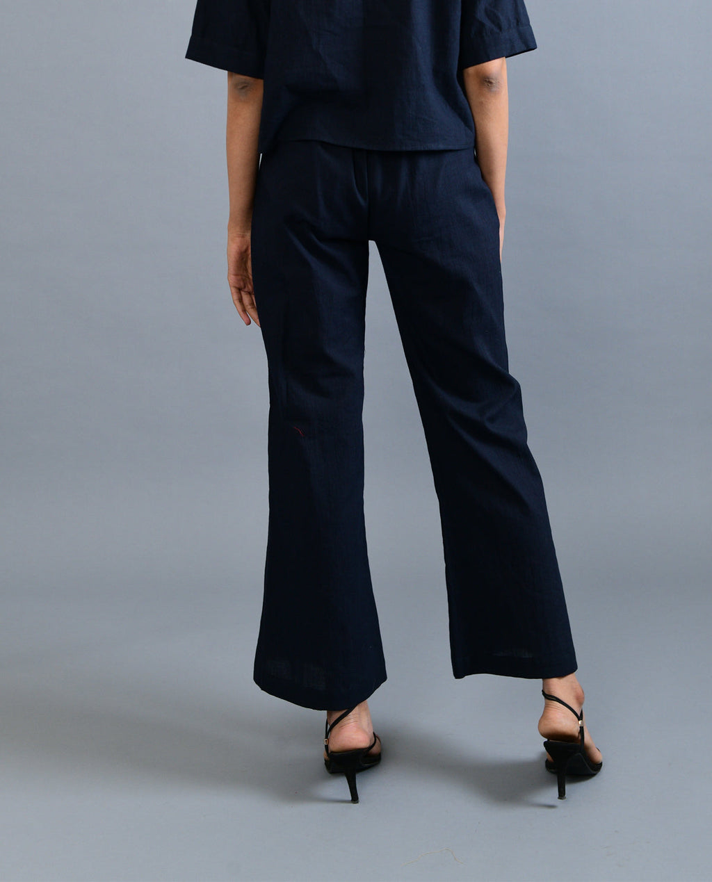 Black Handloom Cotton Pant at Kamakhyaa by Rias Jaipur. This item is Black, Casual Wear, Handloom Cotton, Handspun, Handwoven, Hue, Pants, Regular Fit, Solids, Stripes, Womenswear