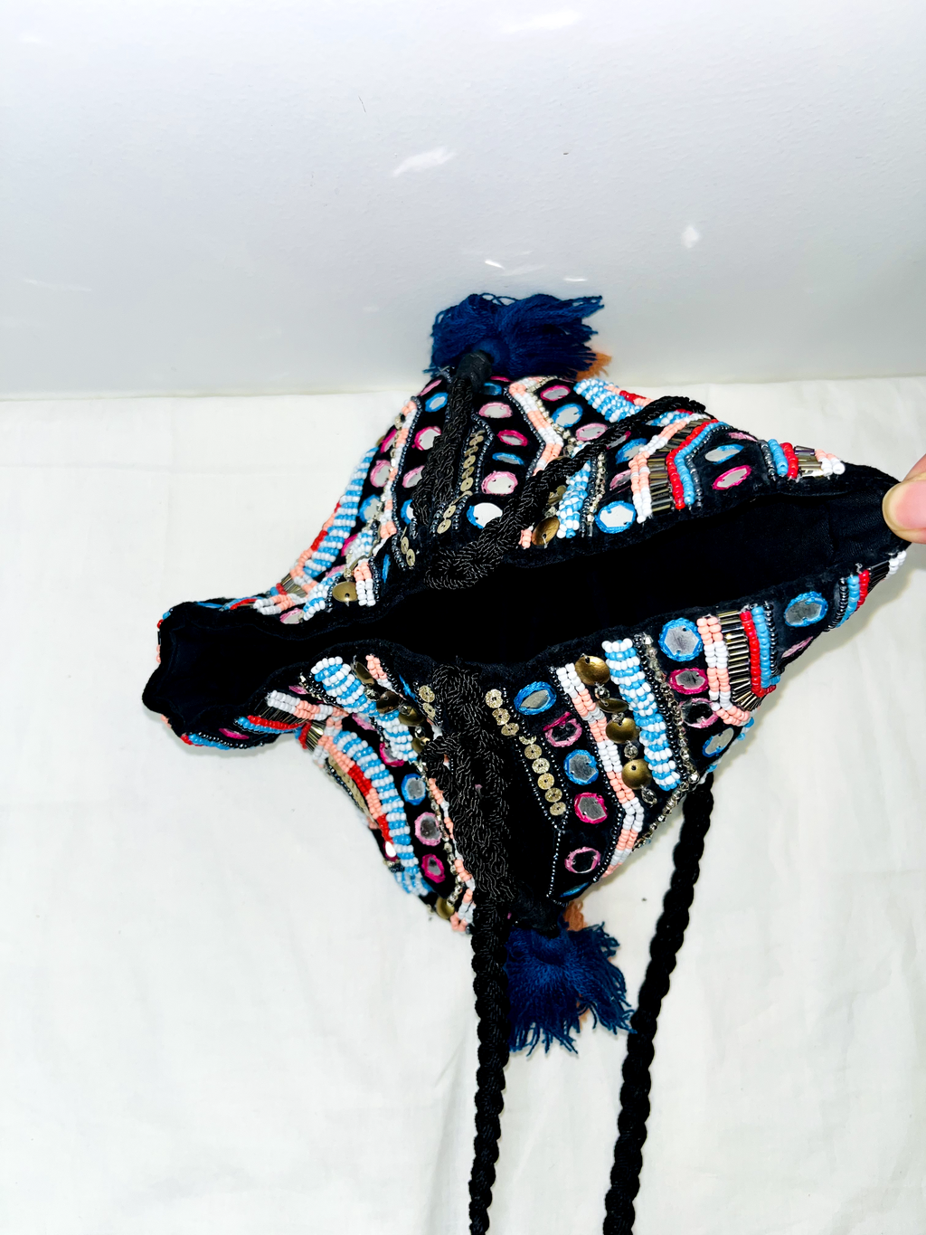 Black Mirror Potli Bag at Kamakhyaa by Pre Loved. This item is Bags, Casual Wear, For Mother, Mirror Work, Multicolor, Natural, Potli Bags