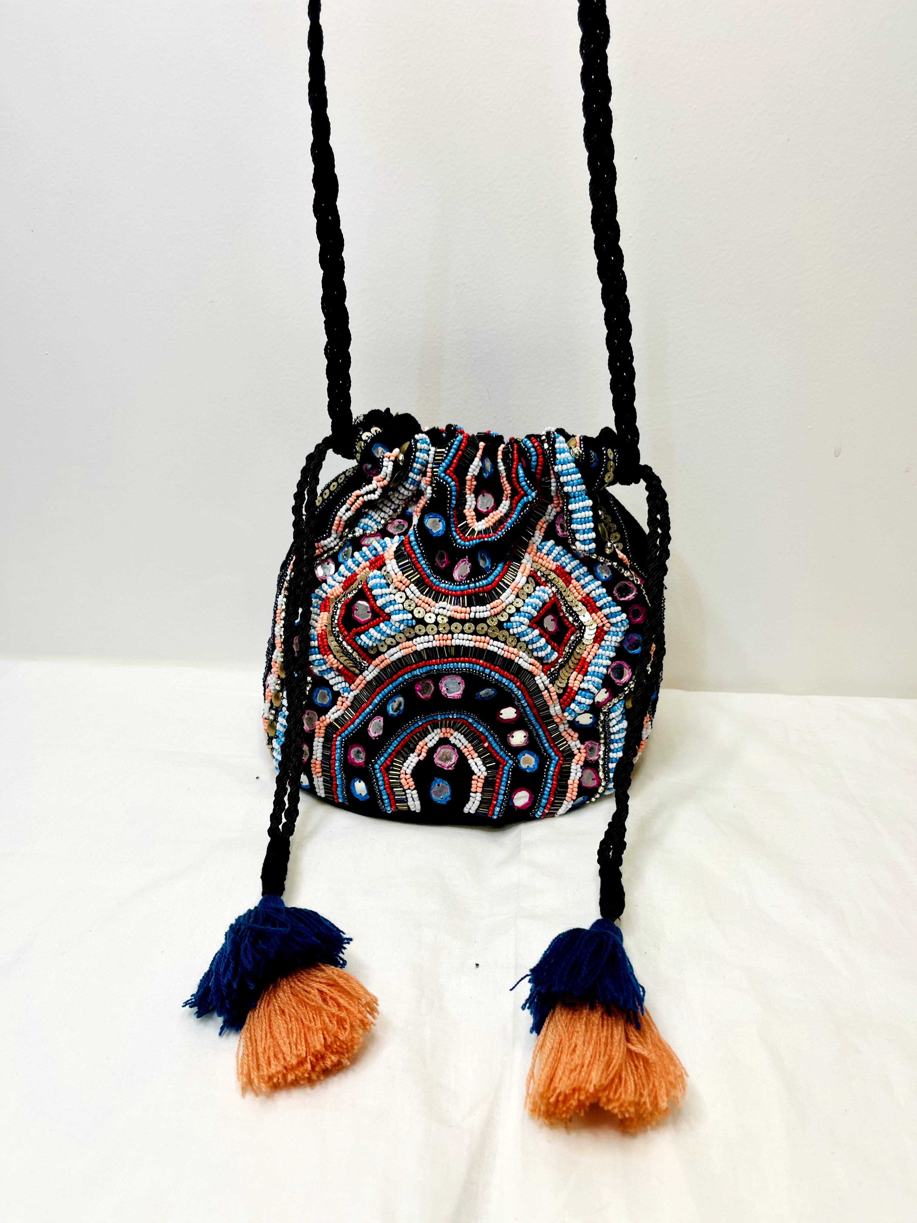 Black Mirror Potli Bag at Kamakhyaa by Pre Loved. This item is Bags, Casual Wear, For Mother, Mirror Work, Multicolor, Natural, Potli Bags