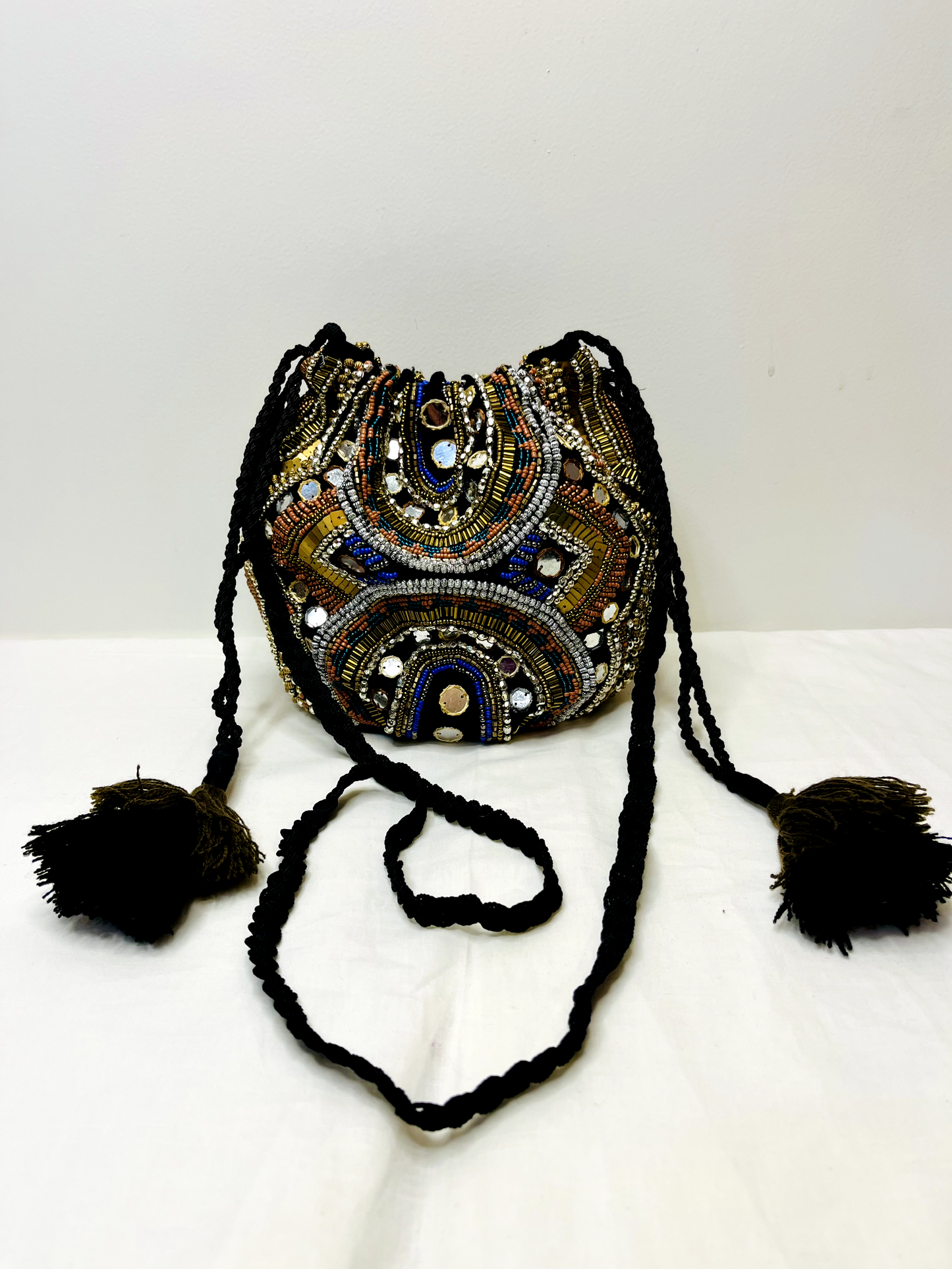 Black Multicolor Beaded Mirror Potli Bag at Kamakhyaa by Pre Loved. This item is Bags, Casual Wear, For Mother, Mirror Work, Multicolor, Natural, Potli Bags