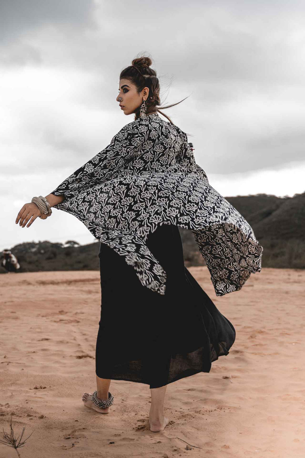 Black Rayon Dress With Cotton Block Printed Asymmetric Cape - Set Of 2 at Kamakhyaa by Keva. This item is Black, Block Prints, Cape, Co-ord Sets, Cotton, Dress Sets, For Mother, For Mother W, Jackets, Midi Dresses, Natural, Relaxed Fit, Resort Wear, Wild Child, Womenswear