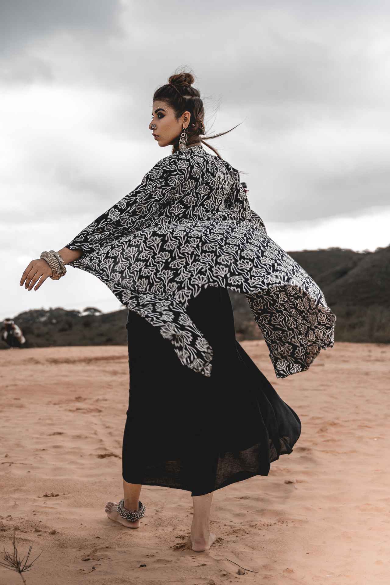 Black Rayon Dress With Cotton Block Printed Asymmetric Cape - Set Of 2 at Kamakhyaa by Keva. This item is Black, Block Prints, Cape, Co-ord Sets, Cotton, Dress Sets, For Mother, For Mother W, Jackets, Midi Dresses, Natural, Relaxed Fit, Resort Wear, Wild Child, Womenswear