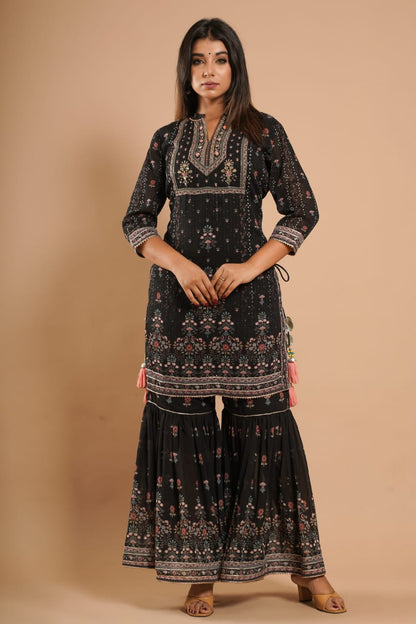 Black Sharara Set at Kamakhyaa by Kamakhyaa. This item is Black, Ethnic Wear, Georgette, Natural, Prints, Regular Fit, Sharara Sets, Shararas, Womenswear