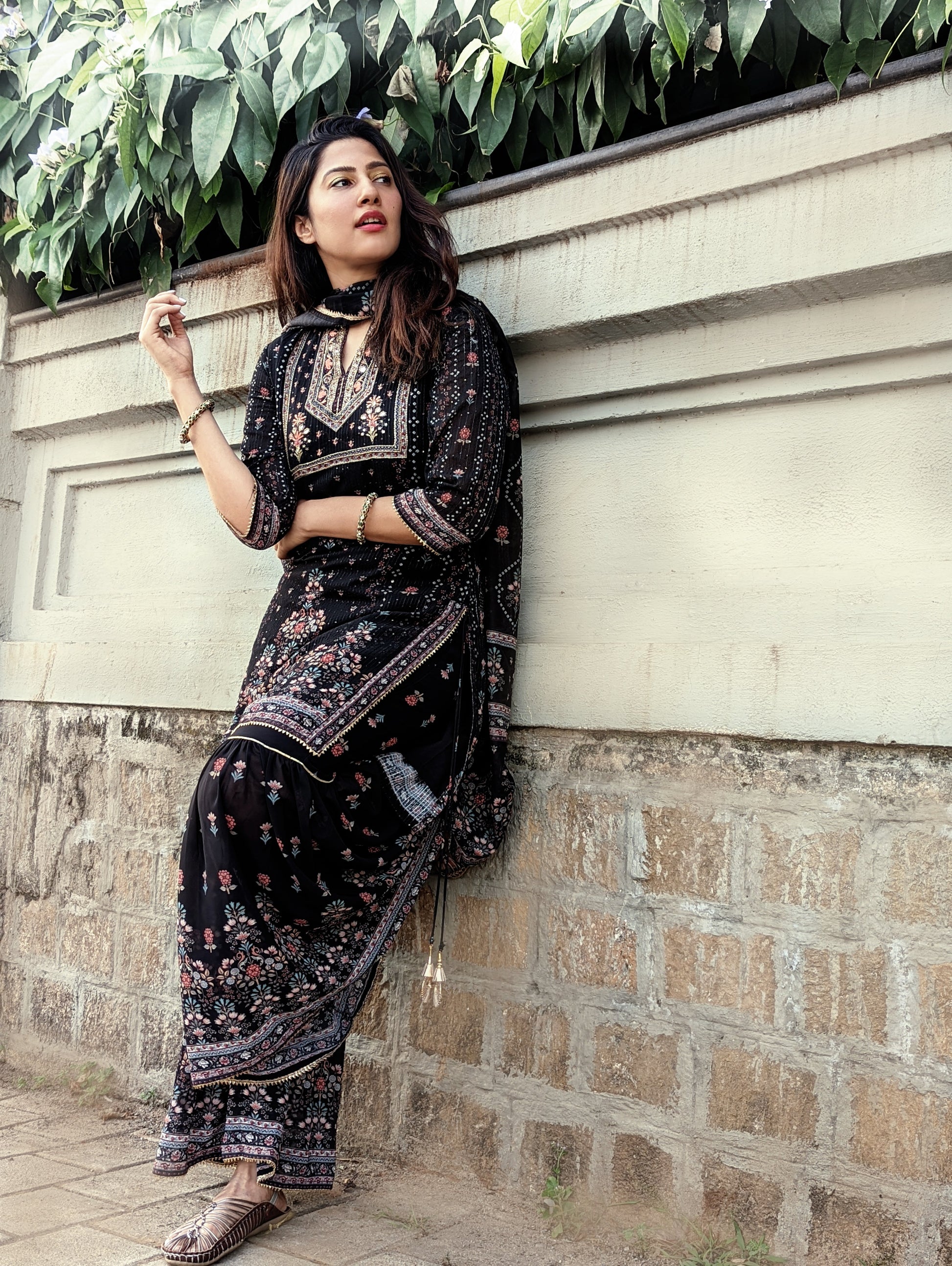 Black Sharara Set at Kamakhyaa by Kamakhyaa. This item is Black, Ethnic Wear, Georgette, Natural, Prints, Regular Fit, Sharara Sets, Shararas, Womenswear