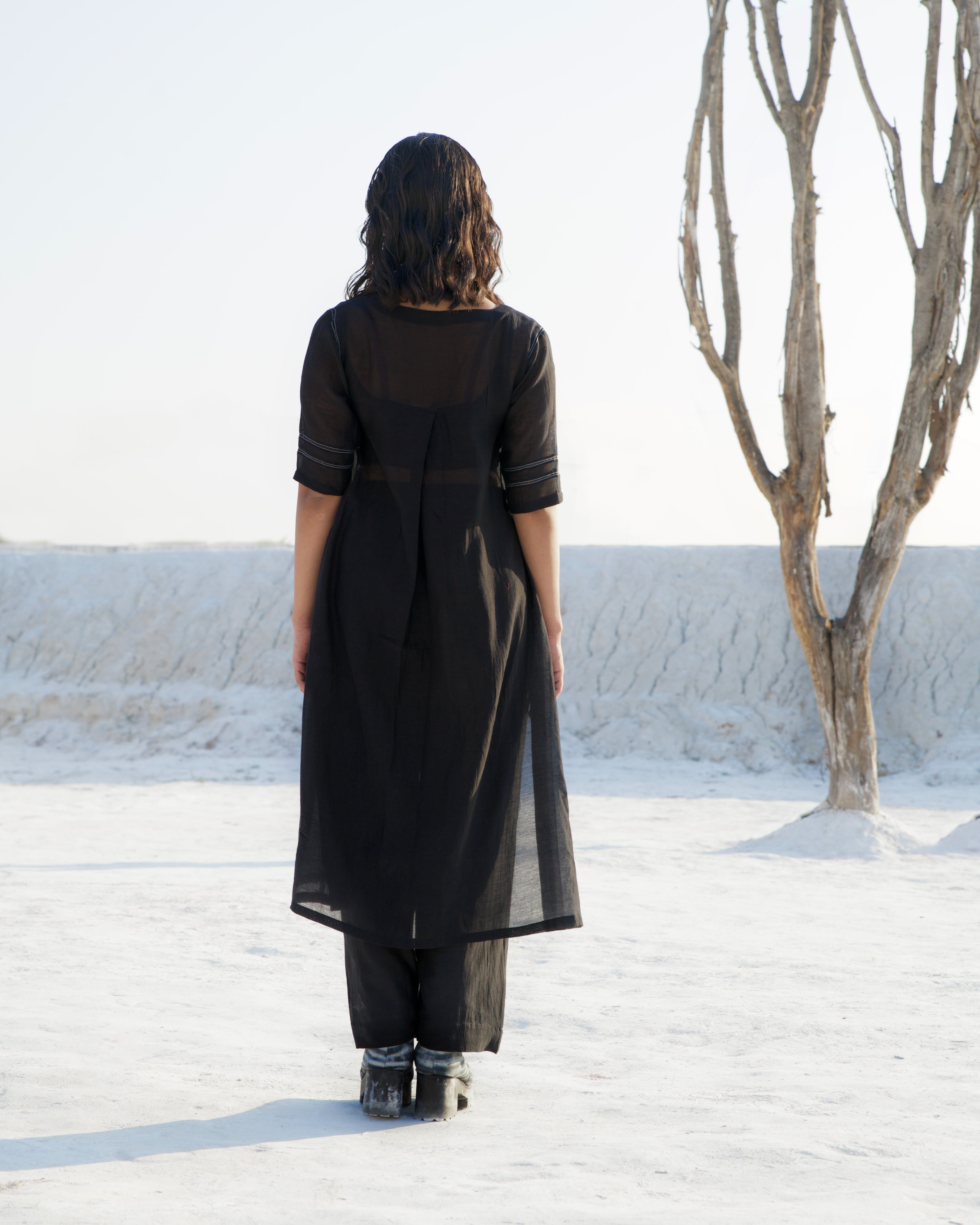 Black Silk Co-ord Set at Kamakhyaa by The Loom Art. This item is Aurora SS24, Black, Casual Wear, Chanderi Silk, Co-ord Sets, For Anniversary, July Sale, July Sale 2023, Loose Fit, Ombre & Dyes, Organic, party, Party Wear Co-ords, Relaxed Fit, Solids, Womenswear