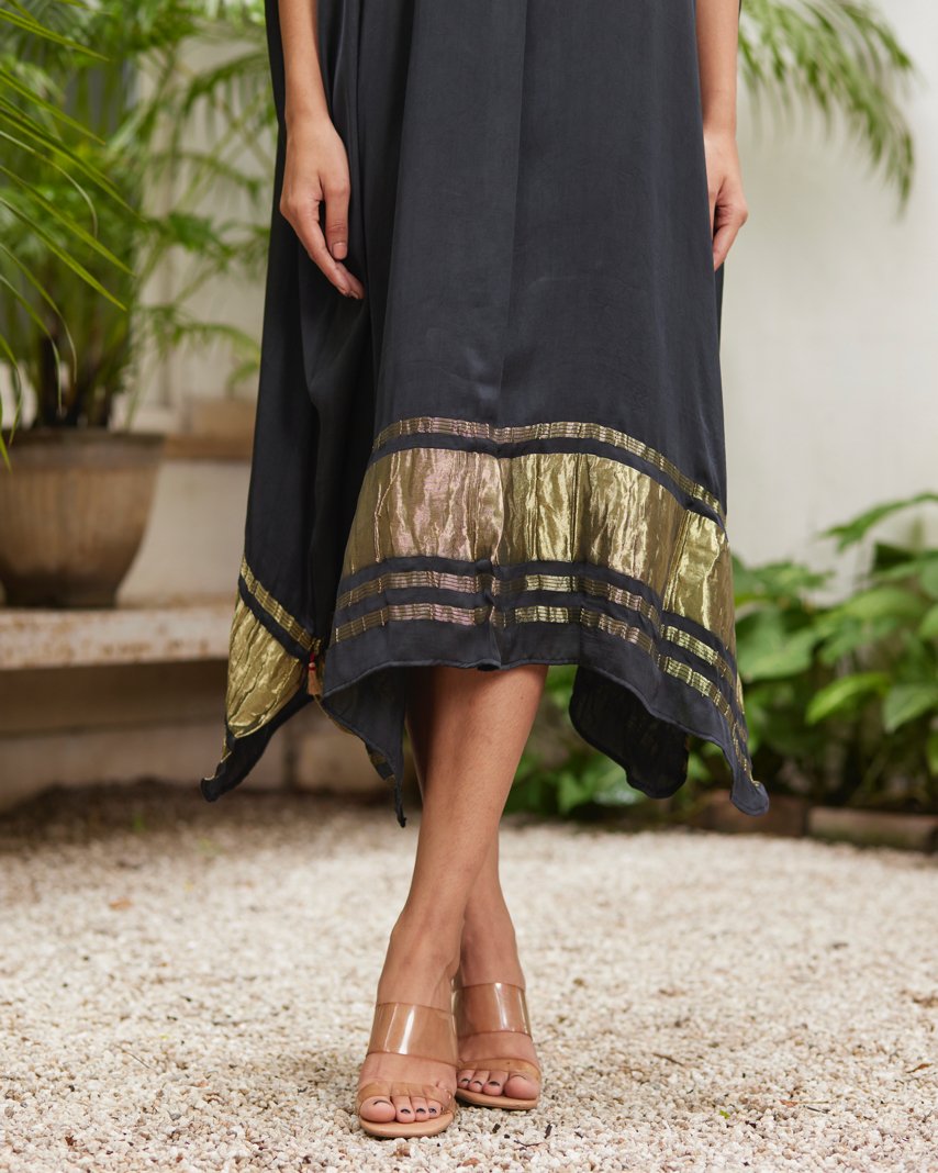 Black Silk Kaftan With Golden Border at Kamakhyaa by Mayura Kumar. This item is Ajrakh Heritage, Black, Casual Wear, Dresses, Festive Wear, Kaftans, Mayura Kumar, Modal Silk, Relaxed Fit, Solids, Womenswear