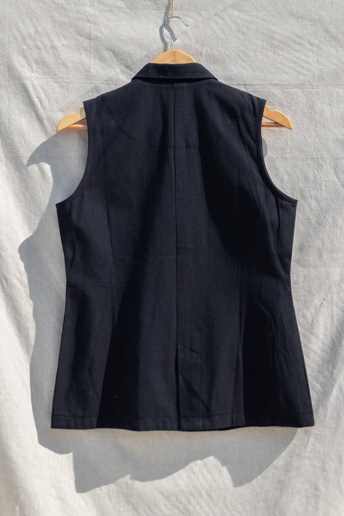 Black Sleeveless Blazer at Kamakhyaa by Anushé Pirani. This item is Black, Blazers, Handwoven Jute Cotton, July Sale, July Sale 2023, Natural, Office Wear, Relaxed Fit, sale anushe pirani, Solids, The Line Tales, Womenswear