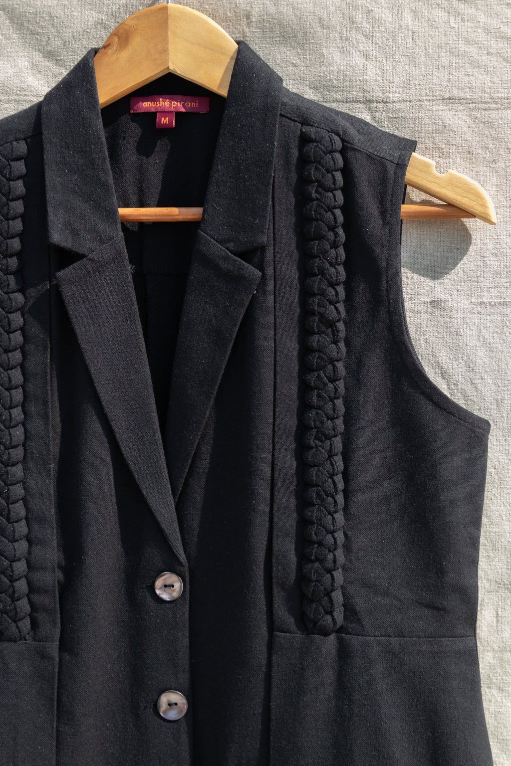Black Sleeveless Blazer at Kamakhyaa by Anushé Pirani. This item is Black, Blazers, Handwoven Jute Cotton, July Sale, July Sale 2023, Natural, Office Wear, Relaxed Fit, sale anushe pirani, Solids, The Line Tales, Womenswear