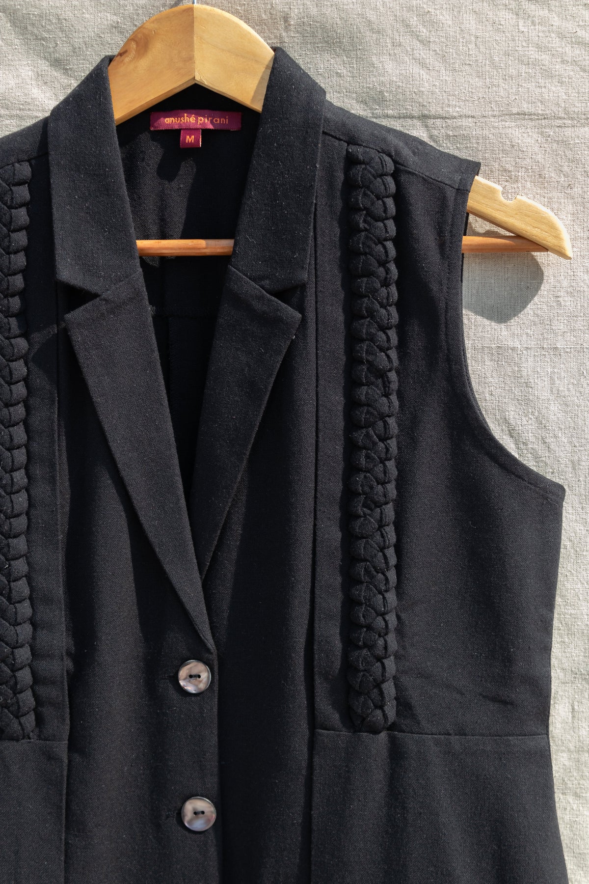 Black Sleeveless Blazer at Kamakhyaa by Anushé Pirani. This item is Black, Blazers, Handwoven Jute Cotton, July Sale, July Sale 2023, Natural, Office Wear, Relaxed Fit, sale anushe pirani, Solids, The Line Tales, Womenswear