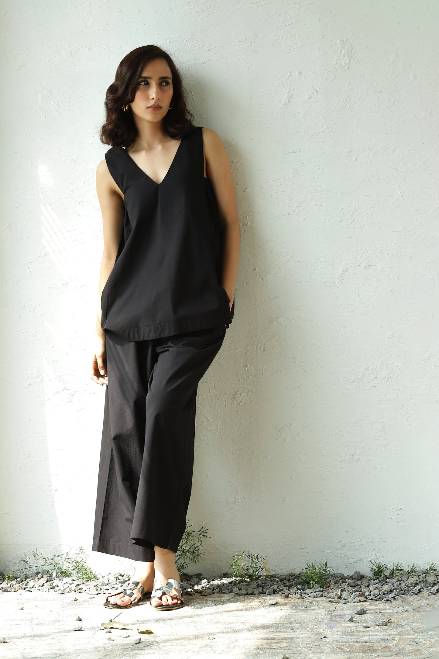 Black Sleeveless V Neck Top With Black Flared Pant Set at Kamakhyaa by Canoopi. This item is Black, Canoopi, Casual Wear, Complete Sets, Natural, Poplin, Regular Fit, Solids, Vacation Co-ords, Womenswear