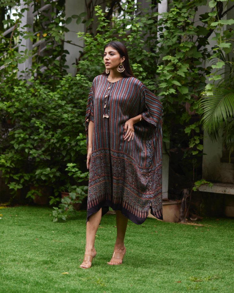 Black Striped Silk Kaftan at Kamakhyaa by Mayura Kumar. This item is Ajrakh Heritage, Black, Casual Wear, Dresses, Festive Wear, Kaftans, Mayura Kumar, Modal Silk, Prints, Relaxed Fit, Silk, Womenswear