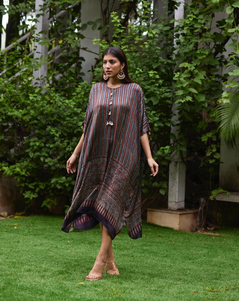 Black Striped Silk Kaftan at Kamakhyaa by Mayura Kumar. This item is Ajrakh Heritage, Black, Casual Wear, Dresses, Festive Wear, Kaftans, Mayura Kumar, Modal Silk, Prints, Relaxed Fit, Silk, Womenswear