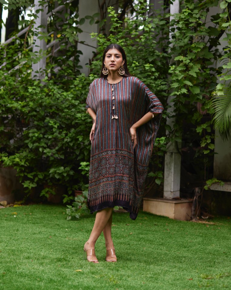 Black Striped Silk Kaftan at Kamakhyaa by Mayura Kumar. This item is Ajrakh Heritage, Black, Casual Wear, Dresses, Festive Wear, Kaftans, Mayura Kumar, Modal Silk, Prints, Relaxed Fit, Silk, Womenswear